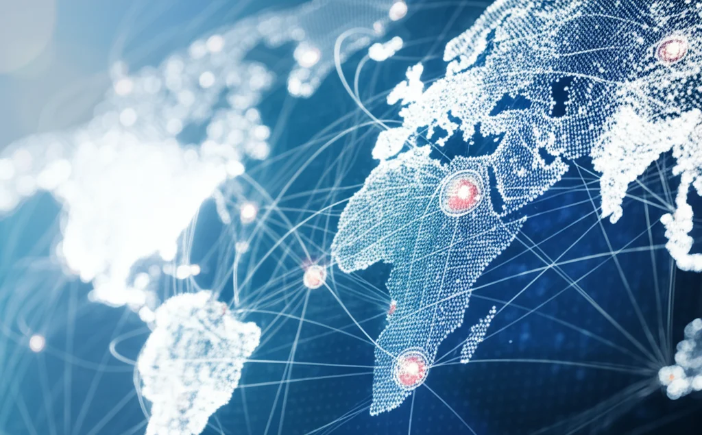 Immagine fotorealistica di una mappa del mondo digitale complessa e caotica, con nodi luminosi di diverse dimensioni (rappresentanti aziende, governi, ONG) collegati da fili aggrovigliati e alcuni isolati, simboleggiando la governance globale frammentata dell'IA. Obiettivo grandangolare 10mm, messa a fuoco nitida, luce ambientale diffusa.