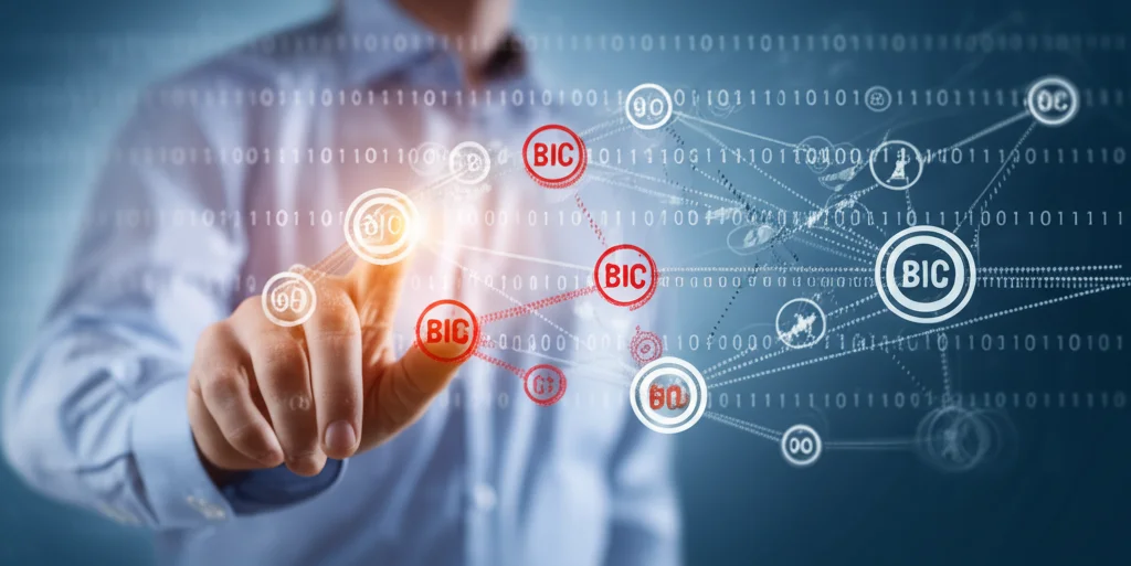 Primo piano di una mano di un analista che indica un punto specifico su uno schermo olografico che mostra una complessa rete di codici BIC interconnessi, alcuni nodi BIC sono evidenziati in rosso, obiettivo 50mm, profondità di campo ridotta, illuminazione high-tech.