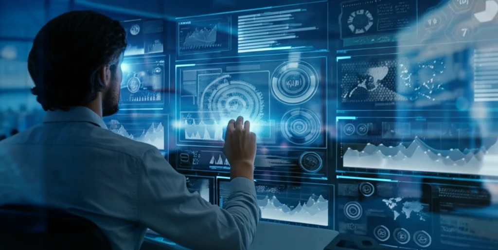Fotografia di un analista di sicurezza che osserva schermi olografici con grafici di comportamento utente e anomalie evidenziate dall'AI, obiettivo zoom 24-70mm, profondità di campo, ambiente high-tech con luci blu soffuse, stile cinematografico.