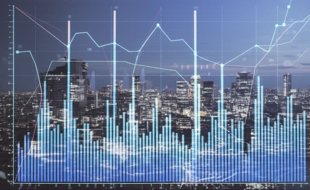 A wide-angle landscape shot of a bustling Japanese city skyline at dusk, with overlaid charts showing economic data trends. Sharp focus, 10mm wide-angle lens.