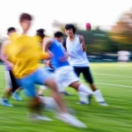 Energetic college students participating in outdoor sports, telephoto zoom, 150mm, fast shutter speed, movement tracking, conveying joy and well-being.
