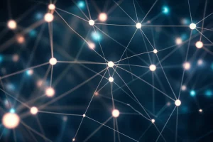 Immagine astratta e artistica di una rete neurale con nodi luminosi e connessioni intricate, che simboleggia l'intelligenza artificiale applicata alla fisica delle particelle per l'estrazione dei Fattori di Forma di Compton. Macro lens, 100mm, high detail, precise focusing, controlled lighting, con un leggero effetto bokeh sullo sfondo.