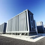 A photorealistic image of a large-scale grid-side battery energy storage system facility under a clear sky, 60mm lens, high detail, representing advanced energy infrastructure.