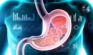 Visualizzazione concettuale della radiomica applicata al cancro gastrico: un'immagine TAC di uno stomaco con aree tumorali evidenziate da un overlay digitale di dati e grafici luminosi, simboleggiando l'analisi quantitativa. Obiettivo prime, 35mm, profondità di campo per mettere a fuoco i dettagli digitali, con un duotone blu e grigio per un look tecnologico e medico.