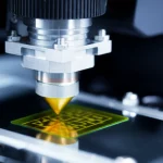Object photography, 105mm Macro lens, high detail, precise focusing, controlled lighting: A high-resolution image of an inkjet printer head depositing perovskite ink onto a glass substrate in a controlled environment.