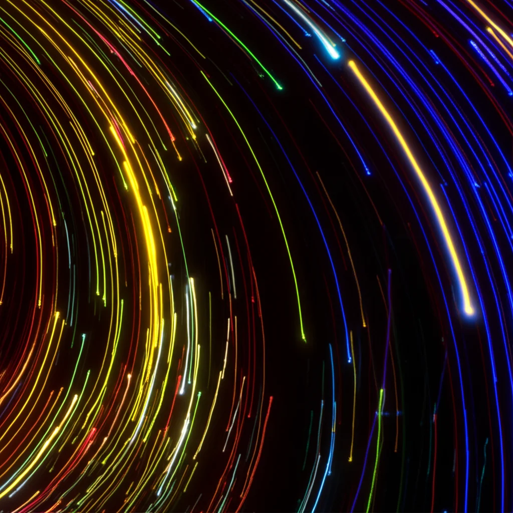 Fotografia macro, obiettivo 100mm, di una simulazione di particelle Vlasov (senza collisioni) che si muovono in un campo magnetico cosmico primordiale, visualizzate come scie luminose colorate su sfondo scuro, alta definizione, illuminazione controllata per enfatizzare le traiettorie curve delle particelle.