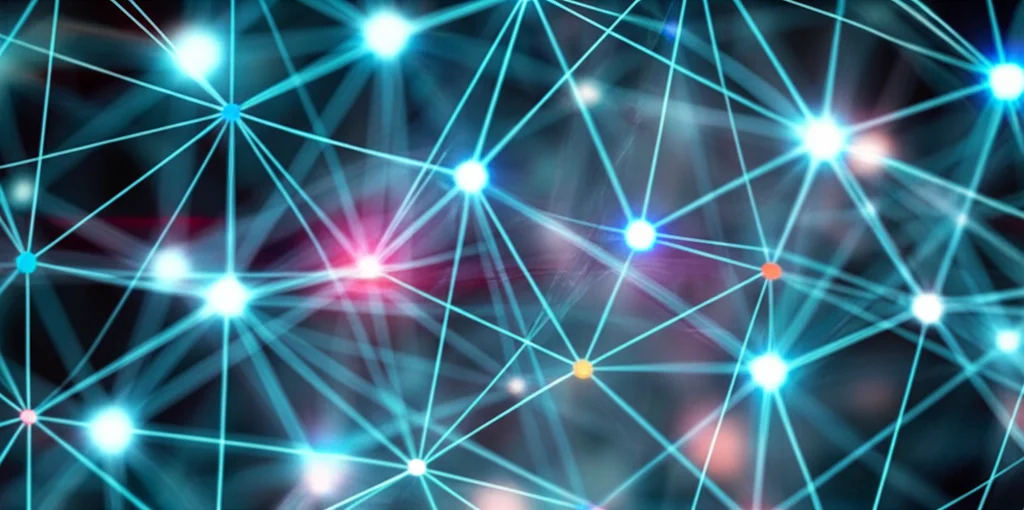 Un'immagine astratta che rappresenta nodi di dati interconnessi in una rete neurale. Alcuni nodi sono luminosi e distinti, altri tendono a fondersi in una massa uniforme, a simboleggiare il problema dell'uniformità degli embedding. Wide-angle lens, 10-24mm, per dare un senso di profondità e complessità della rete, con alcuni nodi a fuoco nitido e altri leggermente sfocati per indicare la perdita di dettaglio.