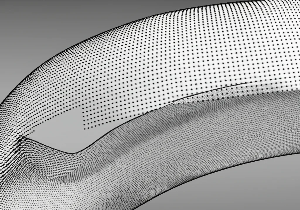 Visualizzazione 3D di due nuvole di punti di un oggetto complesso, una completa e una con una porzione mancante, evidenziando il concetto di mascheramento parziale. Illuminazione da studio, lente macro 85mm, alta definizione per mostrare i dettagli dei punti e della struttura geometrica.
