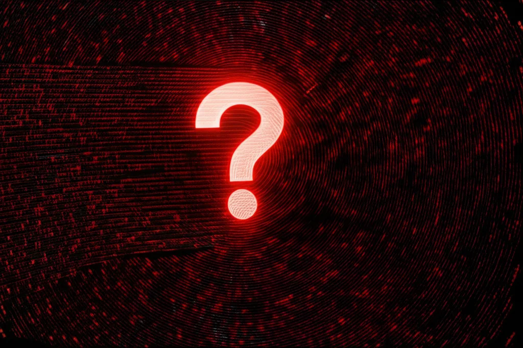 Fotografia concettuale astratta che rappresenta l'indecidibilità: un labirinto infinito fatto di codice binario luminoso (0 e 1) che si perde nell'oscurità profonda, al centro un grande punto interrogativo rosso brillante che emerge dalla nebbia digitale. Obiettivo grandangolare 10mm, lunga esposizione per creare scie luminose nel codice, messa a fuoco nitida sul punto interrogativo, atmosfera misteriosa.