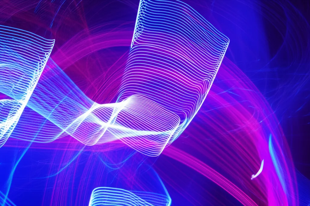 Abstract representation of brain activity, swirling gamma waves, wide-angle, long exposure times, sharp focus.