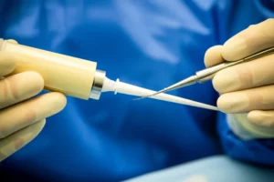 Close-up view of advanced bone cement material being prepared for surgery, macro lens, 60mm, high detail, controlled lighting