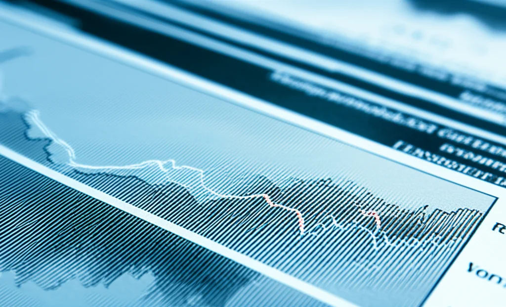 Close-up view of complex medical data charts and graphs, hinting at critical care and health metrics. Macro lens, 60mm, high detail, precise focusing.